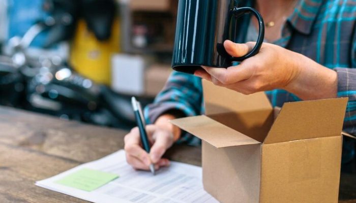 woman preparing new merchandise sell local store parcel delivery ecommerce concept 1048944 18167280.jpg